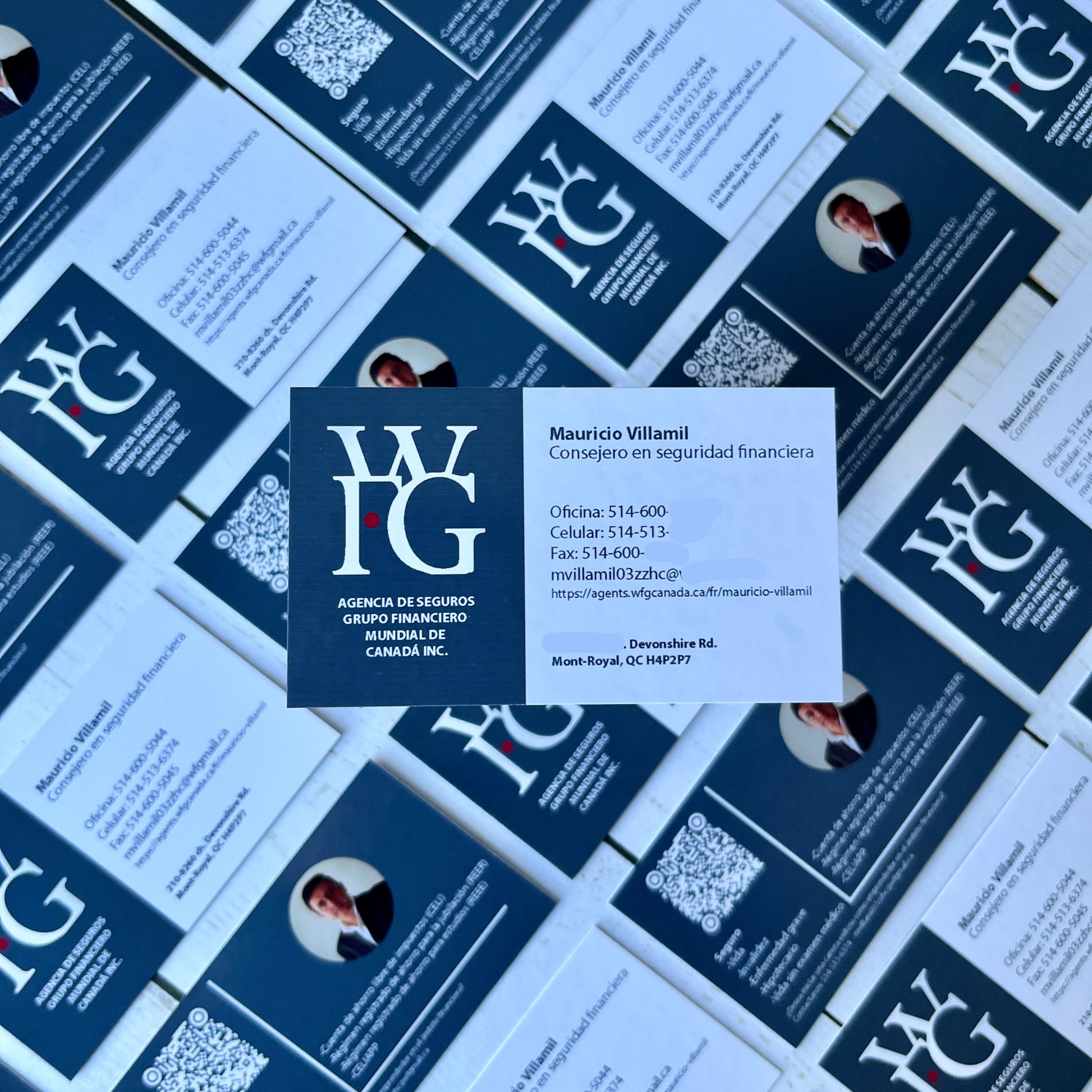 Pattern of blue and white business cards with contact information.