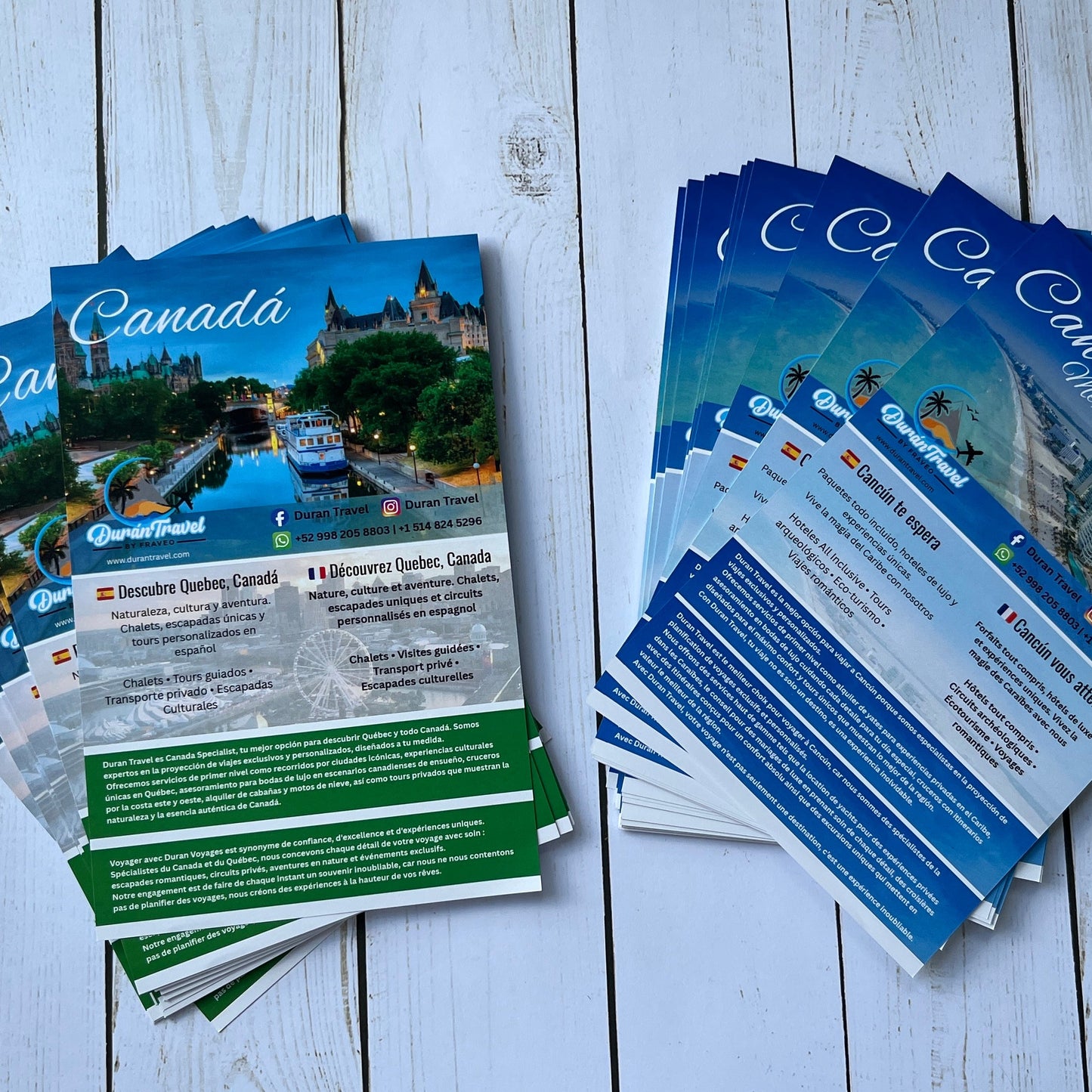 Stacks of brochures on a wooden surface