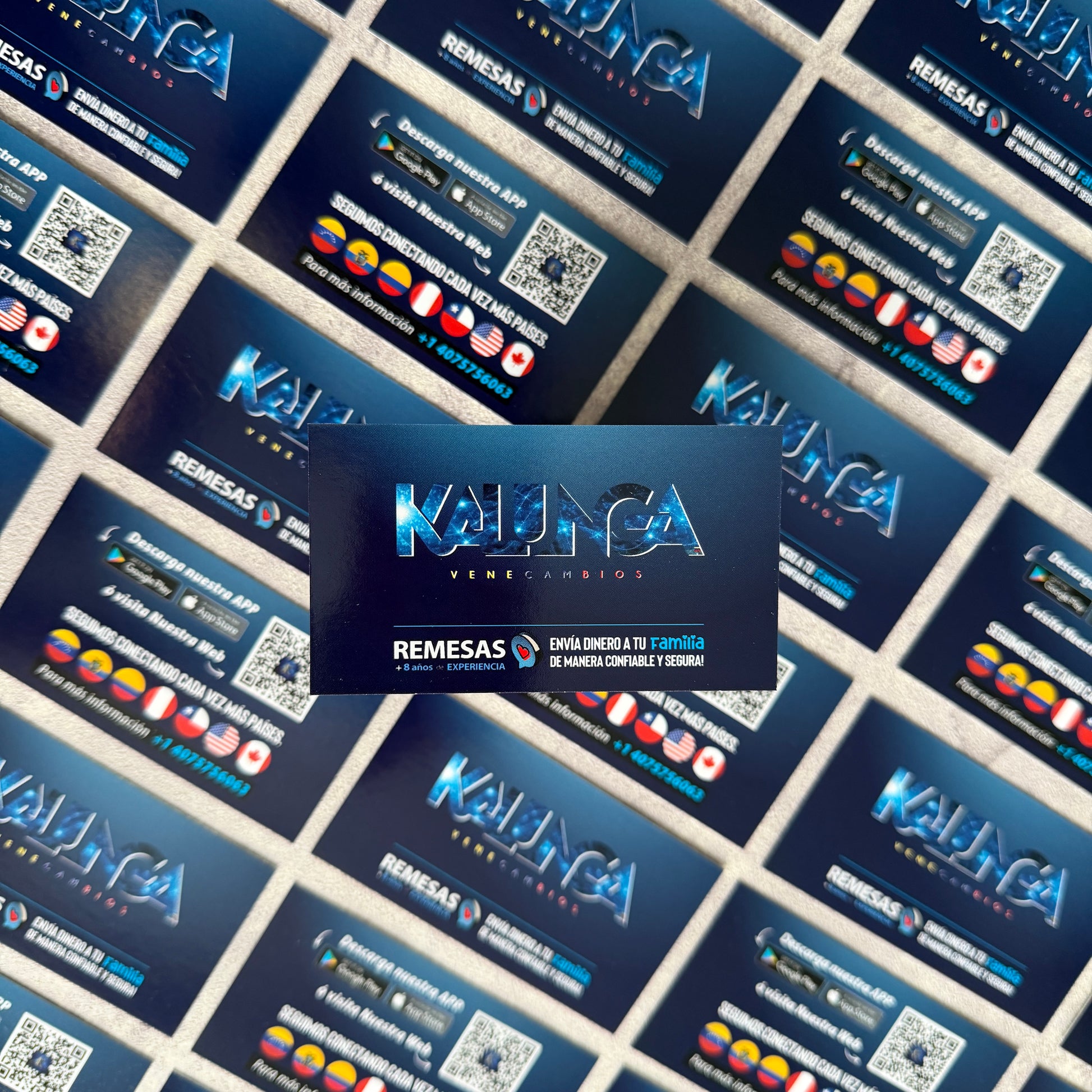 Multiple business cards with 'Kaldnica' and 'Remesas' branding on a grid background.