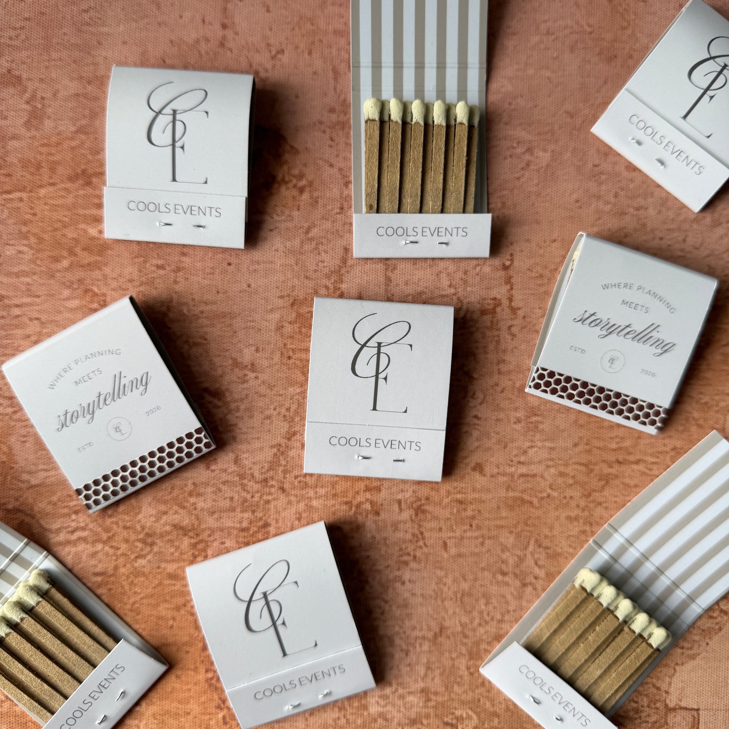 Matches and matchboxes arranged on a textured surface