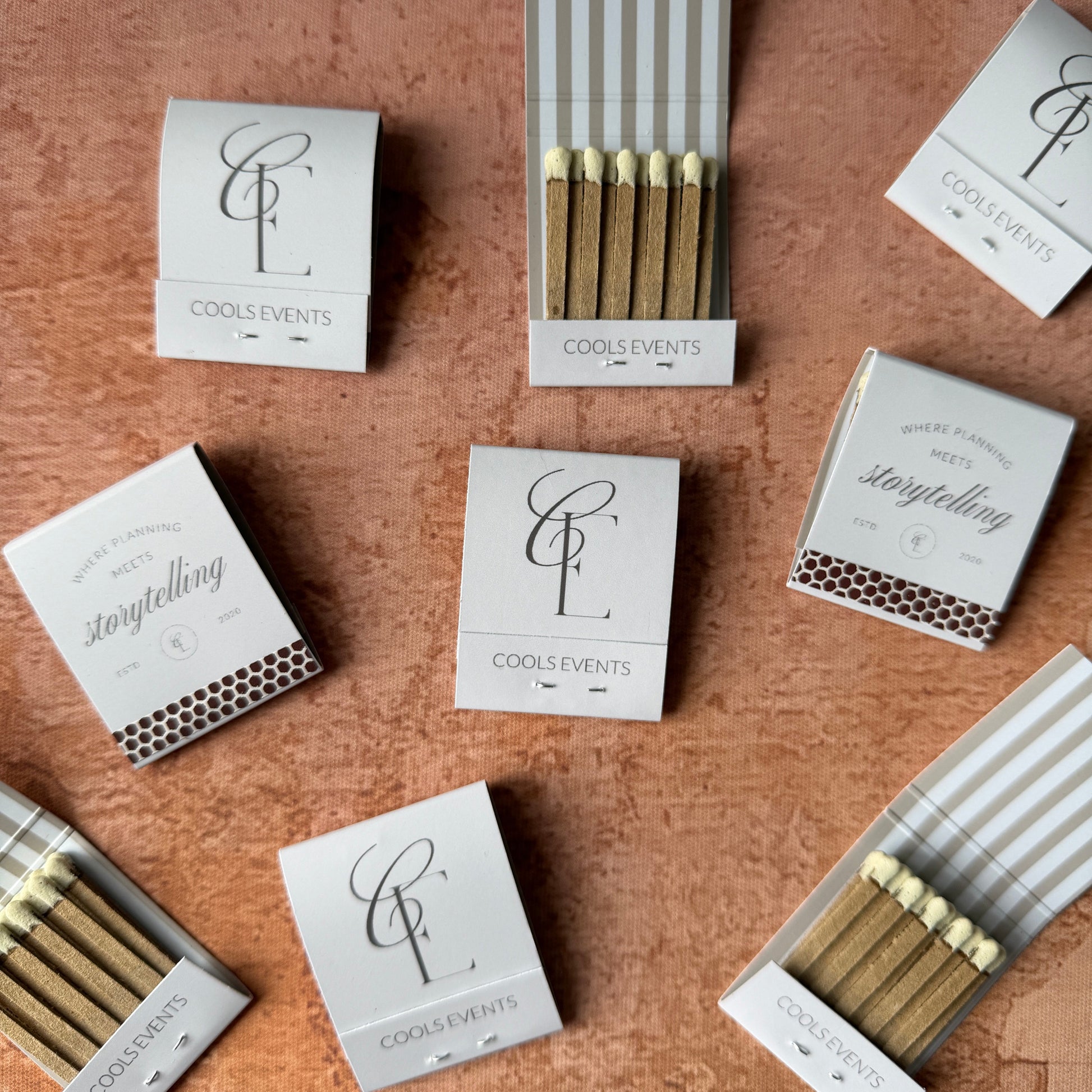 Matches and matchboxes arranged on a textured surface